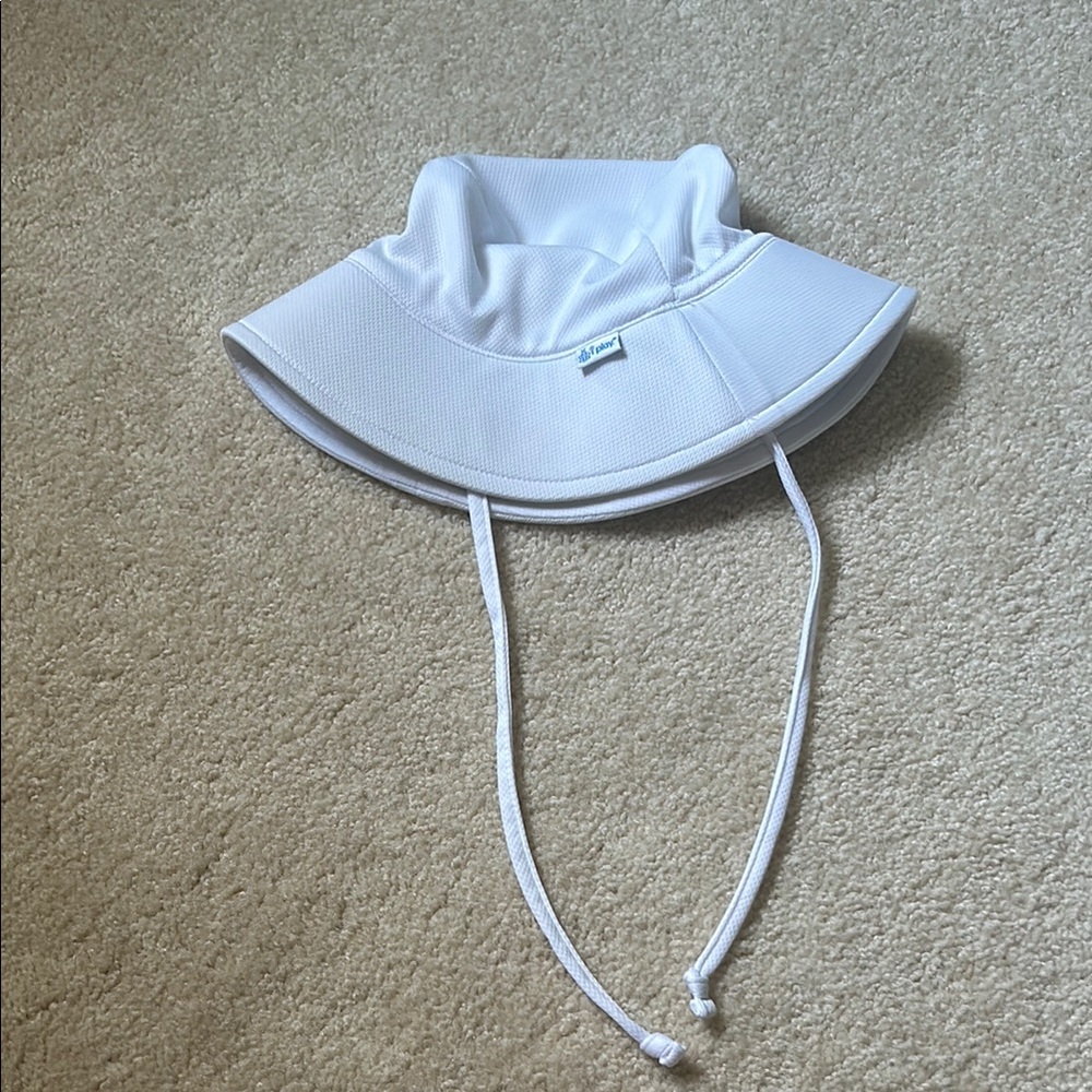 i play. White Bucket Hat with Adjustable Chin Strap